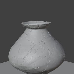 May include: A gray, cracked vase with a rounded body and a flared rim. The surface of the vase is textured with visible cracks and imperfections, giving it an aged appearance. The vase sits on a gray surface.