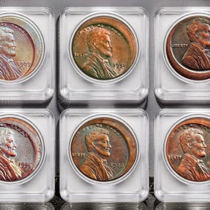 May include: Six vintage copper pennies encased in clear plastic holders. Each coin features a profile of a man and the word "Liberty". The coins are in various states of preservation, with visible wear and oxidation. The image is well-lit, highlighting the details of the coins.