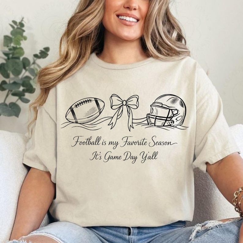 May include: A white ceramic mug with a black handle and the text "But First, Coffee" in a bold, black font. The mug is set against a blurred background, highlighting its clean design.