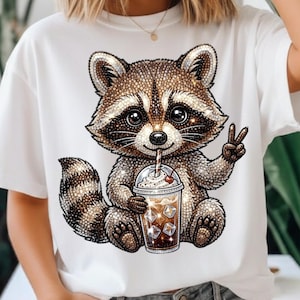 May include: A set of three ceramic mugs with a speckled, matte finish. The mugs are in shades of cream, light gray, and dark gray. Each mug has a simple, minimalist design and a rounded handle.