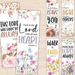 May include: A collection of floral bookmarks with inspirational quotes. The bookmarks feature watercolor flowers in shades of pink, purple, and yellow. Text includes phrases like "The Lord will guide you always" and "Trust in the Lord."