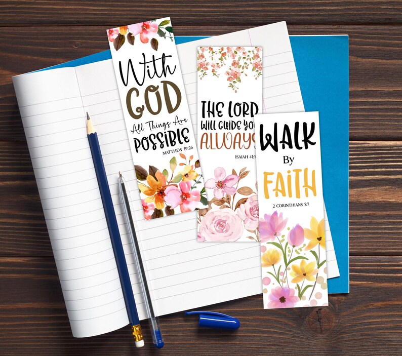 May include: Three floral bookmarks with inspirational quotes. One bookmark reads "With God, All Things Are Possible." Another says "The Lord Will Guide You Always." The third says "Walk By Faith."