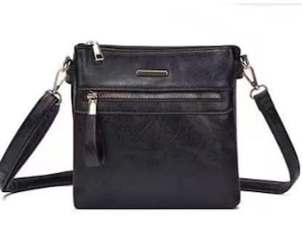 Bolso bandolera pequeño de piel sintética para mujer, con correa ajustable y múltiples bolsillos con cremallera. Ideal para viajes y uso diario.