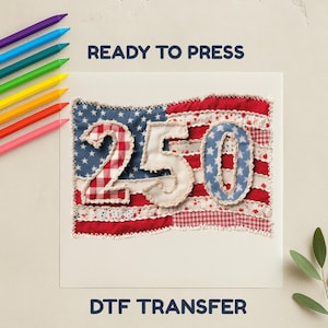 May include: A DTF transfer with a patchwork American flag design and the number "250". The flag uses red, white, and blue fabrics. The text "READY TO PRESS" and "DTF TRANSFER" are displayed. A set of coloured pencils are in the background.