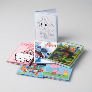 May include: A collection of children's coloring books and activity books featuring popular characters. The books include Hello Kitty, Stitch, Minecraft, Peppa Pig, and Paw Patrol. The books have colorful covers and are stacked on a white surface.