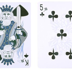May include: Two playing cards on a white background. The King of Spades card features a king holding a sword, with blue and green accents. The other card is the Five of Clubs, with five black clover symbols.