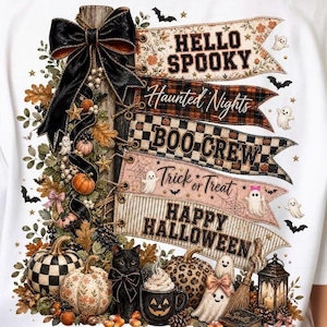 May include: A white t-shirt featuring a graphic of a wooden signpost with five banners reading HELLO SPOOKY, Haunted Nights, BOO-CREW, Trick or Treat, and HAPPY HALLOWEEN, decorated with a black bow, pumpkins, a black cat, and ghosts.
