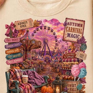 May include: A cream-colored t-shirt featuring a graphic print of an autumn carnival scene with a ferris wheel, carousel, and signs reading ADMIT ONE, AUTUMN CARNIVAL MAGIC, FALL NIGHTS, CARNIVAL LIGHTS, PUMPKIN SPICE, COZY SWEATERS, and SWEET MEMORIES.