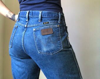 worn out wrangler jeans
