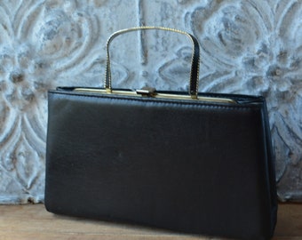 Vintage schlichte schwarze wandelbare Lederhandtasche/Clutch