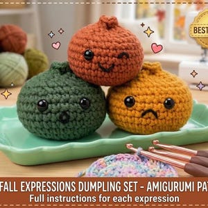 May include: Three crocheted dumpling figures in rust, dark green, and mustard yellow, each with black plastic eyes and embroidered facial expressions. They sit on a light green scalloped tray with crochet hooks and yarn nearby. Text reads: COZY FALL EXPRESSIONS DUMPLING SET - AMIGURUMI PATTERN Full instructions for each expression.