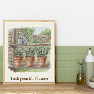 May include: A framed watercolor print featuring a garden scene. Three potted herbs labeled "Mint", "Sage", and "Rosemary" sit on a wooden shelf. A watering can and a garden view are in the background. The text "Fresh from the Garden" is at the bottom.