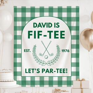 May include: A white and green checkered backdrop with the text "DAVID IS FIF-TEE" in green. The design includes crossed golf clubs, a golf ball, and the words "EST. 1976" and "LET'S PAR-TEE!" in green. The backdrop is for a golf-themed party.