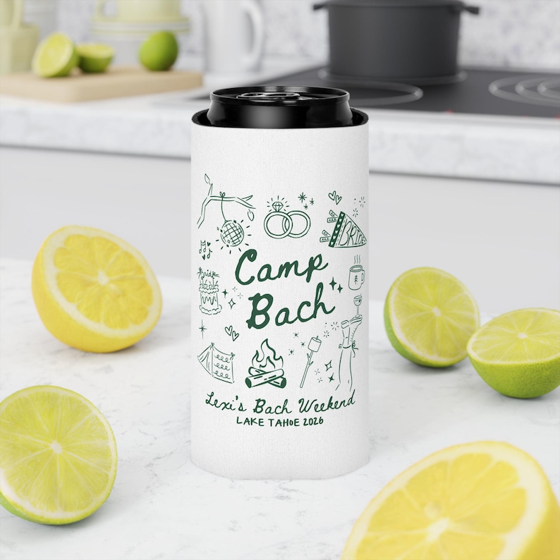 May include: White can cooler with a black top, featuring green line art and the text "Camp Bach." The design includes illustrations of a disco ball, rings, a cake, a campfire, and more. The text "Lexi's Bach Weekend LAKE TAHOE 2026" is also included.