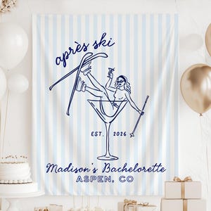 May include: A light blue and white vertical striped fabric backdrop featuring a dark blue line art illustration of a person in a martini glass with skis, the text "après ski", "EST. 2026", "Madison's Bachelorette", and "ASPEN, CO".