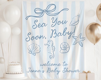May include: A baby shower backdrop with a light blue and white striped pattern. The text "Sea You Soon, Baby!" is written in blue script, along with seashell and seahorse illustrations. The words "welcome to Jenna's Baby Shower" are also included.