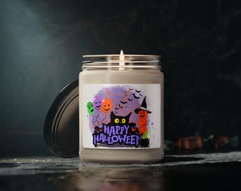 May include: A lit candle in a glass jar with a black lid. The label features a purple background with Halloween-themed graphics, including a black cat, balloons, and the words "Happy Halloween."
