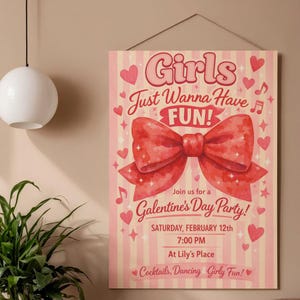 Może przedstawiać: Różowy i biały plakat na imprezę z okazji Dnia Galentynki z napisem "Girls Just Wanna Have FUN!" i dużą czerwoną kokardą. Plakat zawiera datę, godzinę i miejsce imprezy, a także słowa "Cocktails, Dancing & Girly Fun!"