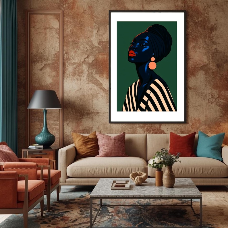 May include: A framed art print featuring a stylized portrait of a woman with dark skin, wearing a black head wrap and orange earrings. The woman's lips are red, and she is wearing a black and white striped top. The background is dark green.