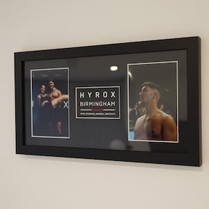May include: A black framed photo collage featuring two images. The left image shows two people, and the right image shows a man. The center of the frame has the text "HYROX BIRMINGHAM" and "OPEN_DOUBLES_SEASON_2023/2024".