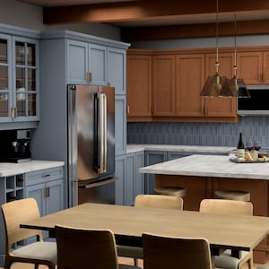 Peut inclure: Une cuisine moderne avec des armoires bleues et marron, des appareils électroménagers en acier inoxydable et un îlot central. La cuisine comprend une table à manger avec des chaises, une cafetière intégrée et un robinet doré. Le design est contemporain et élégant.