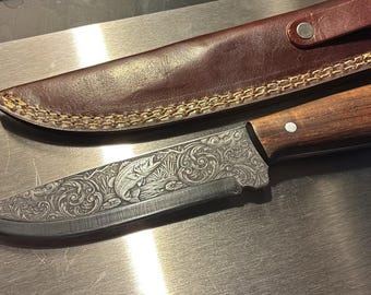 Engraved fixed blade knife