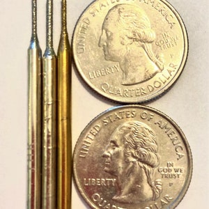 Diamond drill bits for beach glass and sea shells.  Fits your Dremel.