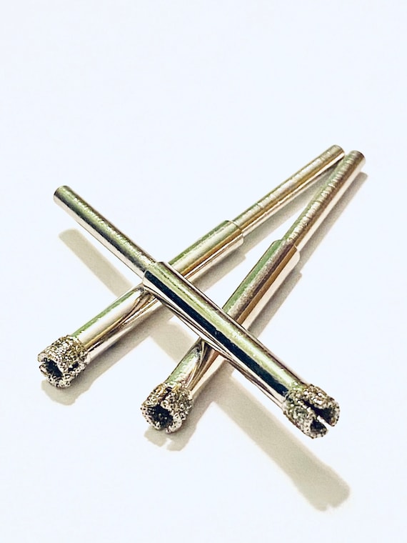 Diamond core drill bit for glass outlet