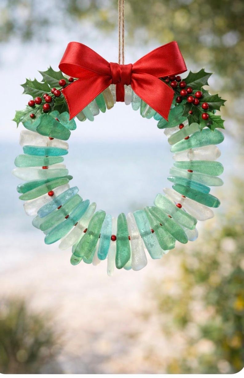 use diamond drill bits and your Dremel tool to drill sea glass to make a drilled sea glass Christmas wreath.