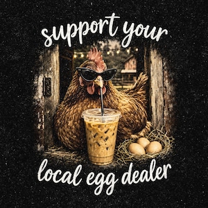 May include: A brown chicken wearing black cat-eye sunglasses, drinking an iced coffee from a clear plastic cup with a straw, positioned next to a small nest of three brown eggs. The text "support your local egg dealer" is written in white.