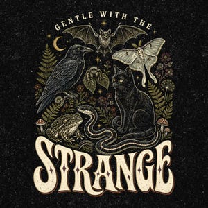 May include: A black graphic print featuring the text GENTLE WITH THE STRANGE. The illustration includes a bat, a moth, a raven, a black cat, a toad, a snake, and a spider surrounded by ferns, flowers, mushrooms, and a crescent moon.