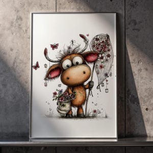 May include: A framed print featuring a whimsical cartoon cow with large eyes, holding a flower net and a pot of flowers. The cow is brown and tan with red accents, surrounded by butterflies and flowers. The artwork has a hand-drawn style.