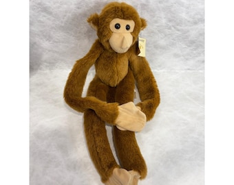 Peluche de mono colgante de peluche marrón con brazos y piernas largos y cierre de gancho, juguete de Brooklyn Doll