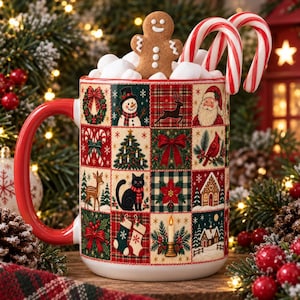 May include: A ceramic mug with a red handle and a grid pattern featuring Christmas icons including a snowman, reindeer, Santa Claus, a black cat, a gingerbread man, and candy canes. The mug is filled with white marshmallows and candy canes.