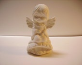 Christmas Angel on a Mushroom figurine Unpainted Ceramic Bisque Ware
