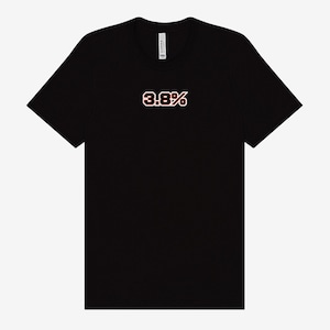 May include: Black t-shirt with the text "3.8%" in a brown and white font. The shirt is a crew neck style and appears to be made of a soft material. The shirt is a solid black color.