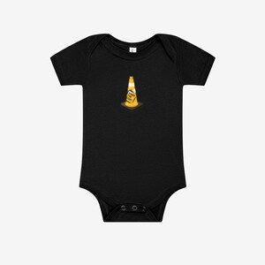 May include: A black short-sleeve baby bodysuit featuring a small graphic of a yellow and white traffic cone in the center. The cone has a black square label with the white text HOIST THE CONE printed on it. The garment has a round neckline.