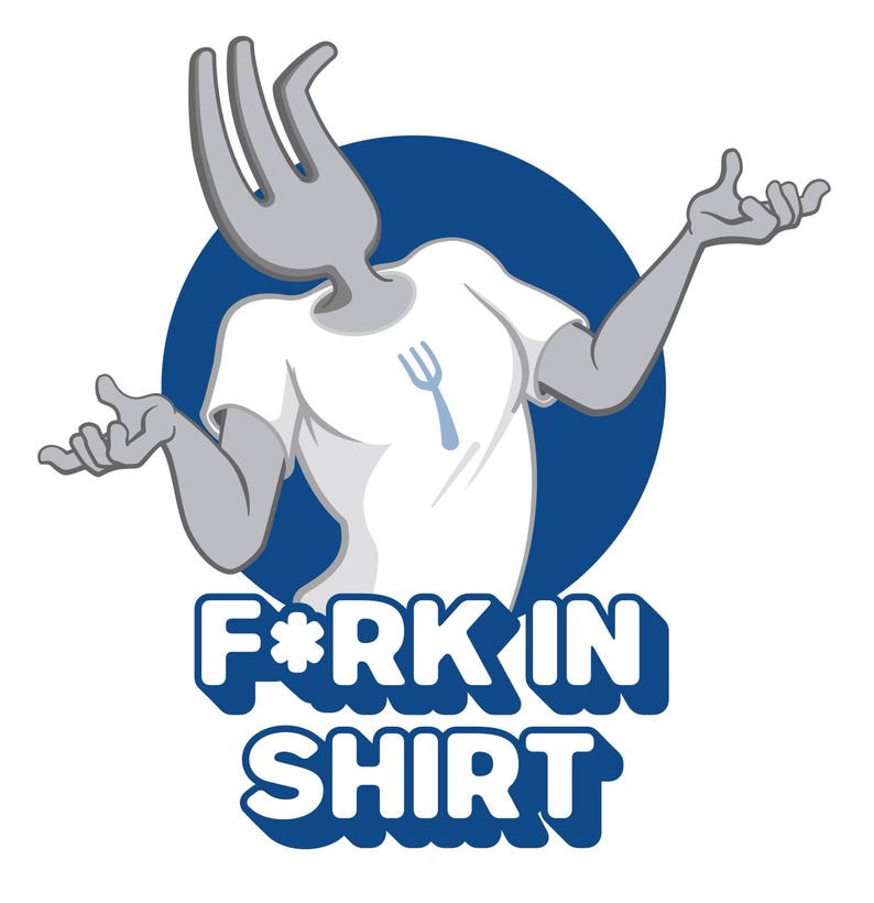 May include: A graphic illustration featuring a grey anthropomorphic fork character with a fork-shaped head, wearing a white t-shirt with a small blue fork icon on the chest. The text F*RK IN SHIRT appears in bold white letters with a blue drop shadow.