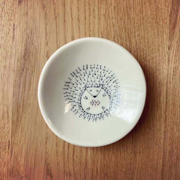 Curled up hedgehog ceramic trinket dish