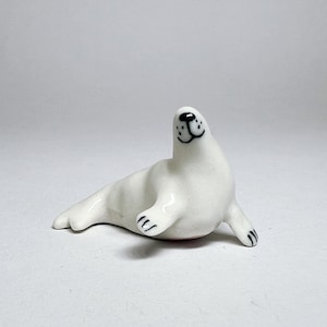 White porcelain ceramic seals figurines