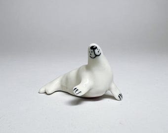 White porcelain ceramic seals figurines
