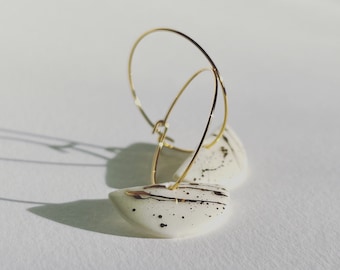 Gold galaxy white porcelain half moon earrings on hoops