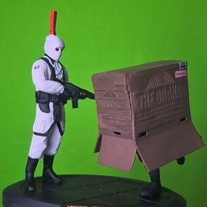 Snake Box Metal Gear Solid Diorama 15 x 15 cm (6 Zoll), handbemalt – Kartonbox & Wachszene – individuell 3D-gedruckte Stealth-Statue