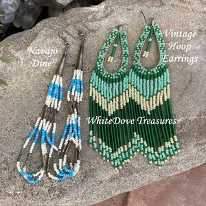 May include: Two pairs of beaded earrings. The pair on the left is white, blue, and turquoise. The pair on the right is green, white, and yellow. The text "Navajo Dine" is on the left and "Vintage Hoop Earrings" is on the right.