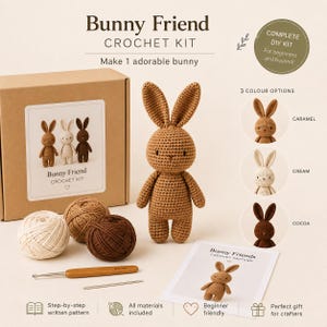 May include: A Bunny Friend crochet kit featuring a cardboard box, three balls of yarn in cream, caramel, and cocoa, a 2.5 mm crochet hook, a needle, and a printed pattern. A finished caramel-coloured crocheted bunny stands in the centre.