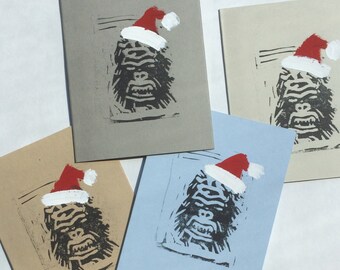 Holiday card, "Kringle Kong," handmade linocut with gouache added