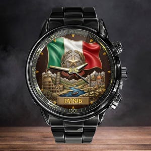 May include: Black wristwatch with a brown face featuring the Italian flag, a star emblem, and famous landmarks. The watch has a black metal band and the name "JACOB" is displayed on the face.