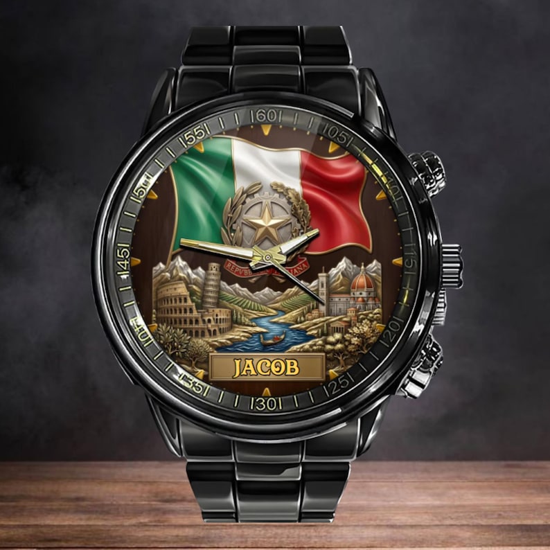May include: Black wristwatch with a brown face featuring the Italian flag, a star emblem, and famous landmarks. The watch has a black metal band and the name "JACOB" is displayed on the face.
