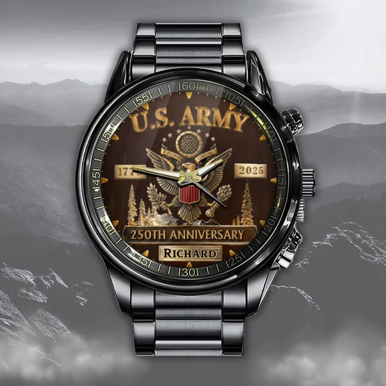 May include: A stainless steel watch with a brown face featuring the text "U.S. ARMY" and "250TH ANNIVERSARY". The watch face includes an eagle emblem and the name "RICHARD". The watch has a black bezel and a silver band.