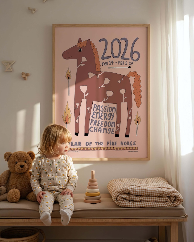 Fire horse art print framed in kids room with a little girl sitting next to it
